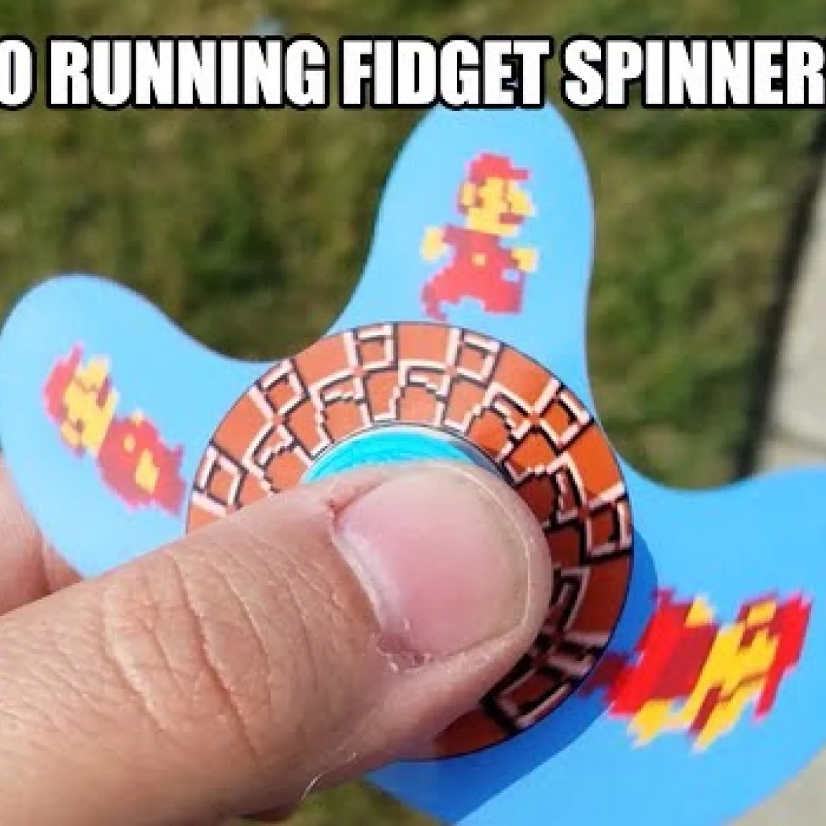 Close-up of person holding blue and red fidget spinner with motion effect graphics