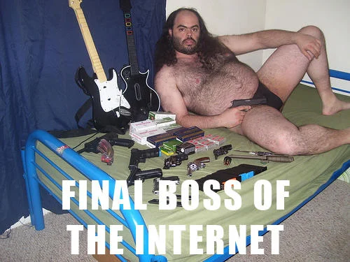 Final Boss Of The Internet — Shirtless man surrounded by guitars and amplifiers labeled as final boss.