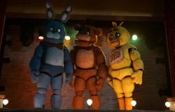 Five Nights at Freddy's Memes — Dark atmospheric image of Freddy, Bonnie, and Chica in game location.