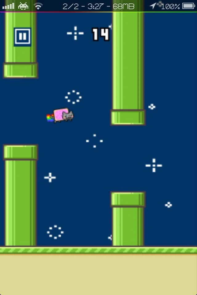 Mobile screenshot showing active Flappy Bird gameplay with score 14.