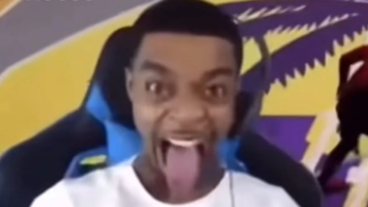 FlightReacts Tongue Out — FlightReacts sitting in gaming chair with wide eyes and tongue sticking out