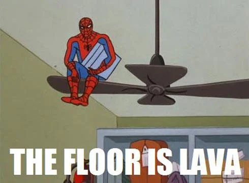 Spider-Man perched on ceiling fan with 'THE FLOOR IS LAVA' text overlay.