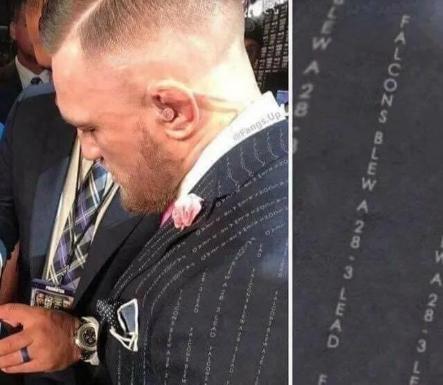 Floyd Mayweather Vs Conor Mcgregor — Parody of McGregor pinstripe suit edited to read 9/11 was an inside job