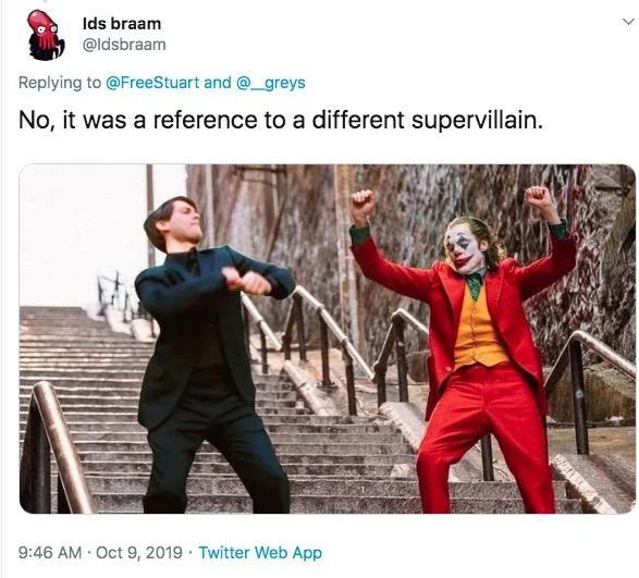 For Those Who Didn't Catch the Reference — Tweet comparing Joaquin Phoenix dancing on stairs with Tobey Maguire's Bully Maguire dance.