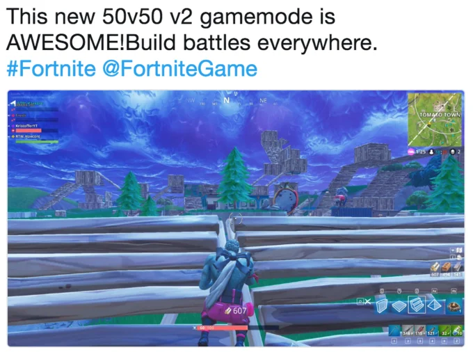 Tweet screenshot praising the Fortnite 50v50 v2 gamemode with in-game build battle image