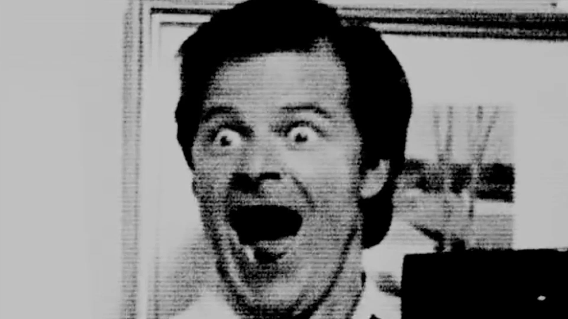 Frank Heffley Schizophrenia — Grainy black-and-white close-up of Frank Heffley yelling with wide eyes and open mouth
