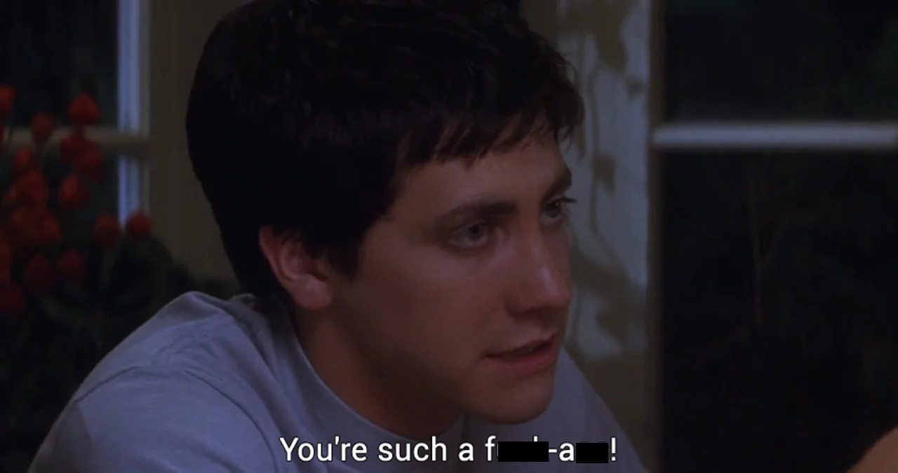 Fuckass — Jake Gyllenhaal film still with subtitle reading 'You're such a f**k-a**!'