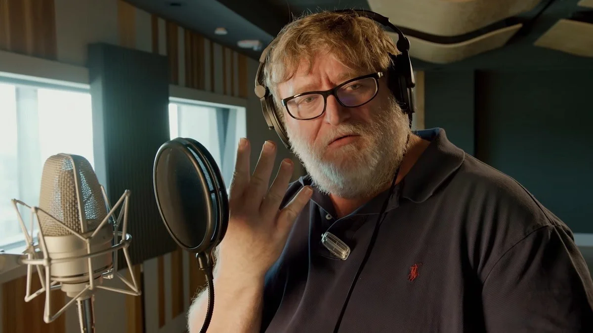 Gaben — Gabe Newell wearing headphones speaking into a studio microphone