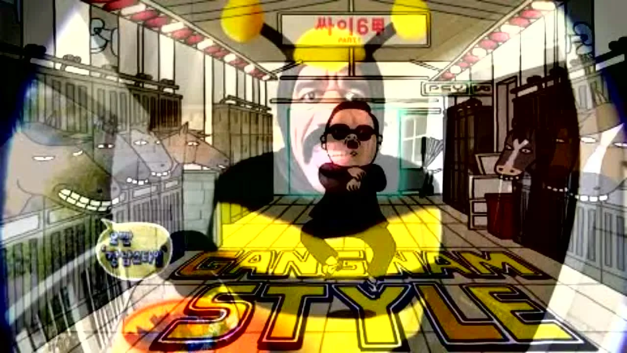PSY performing the horse-riding Gangnam Style dance in a stable setting with horses visible, overlaid with large yellow 'GANGNAM STYLE' text.