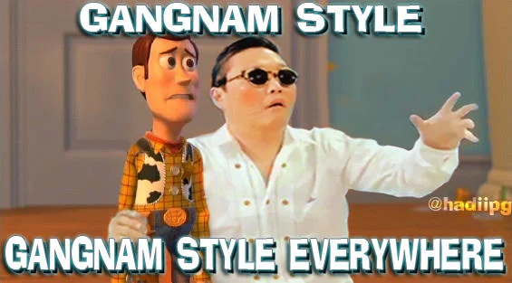 Toy Story characters Woody and Buzz with text 'GANGNAM STYLE EVERYWHERE' performing the iconic dance pose.
