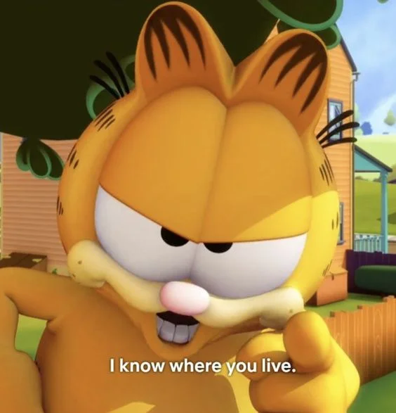 Garfield's "I Know Where You Live" — Screenshot of 3D Garfield from The Garfield Show captioned 'I know where you live.'