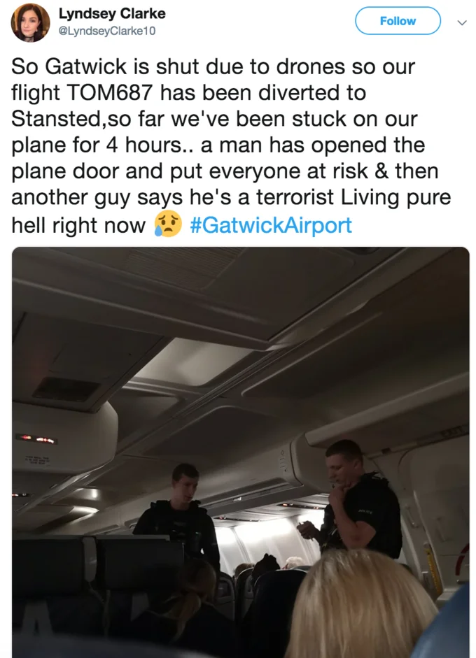 Gatwick Drone — Tweet by Lyndsey Clarke about flight TOM687 diverted to Stansted with police officers boarding the plane.