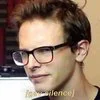 A close-cropped facial image in warm tones, possibly related to the Gay Silence meme but with limited context.