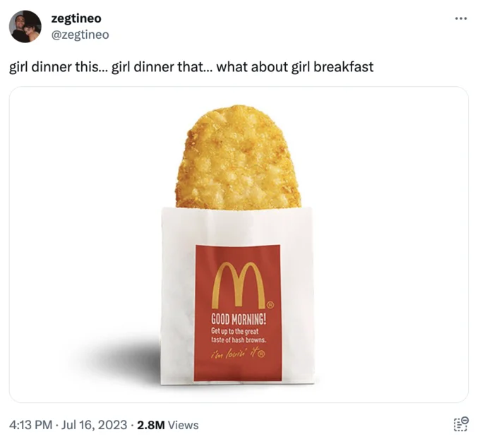 Twitter post expanding Girl Dinner concept to breakfast using McDonald's hash brown wrapper as minimal-effort meal.