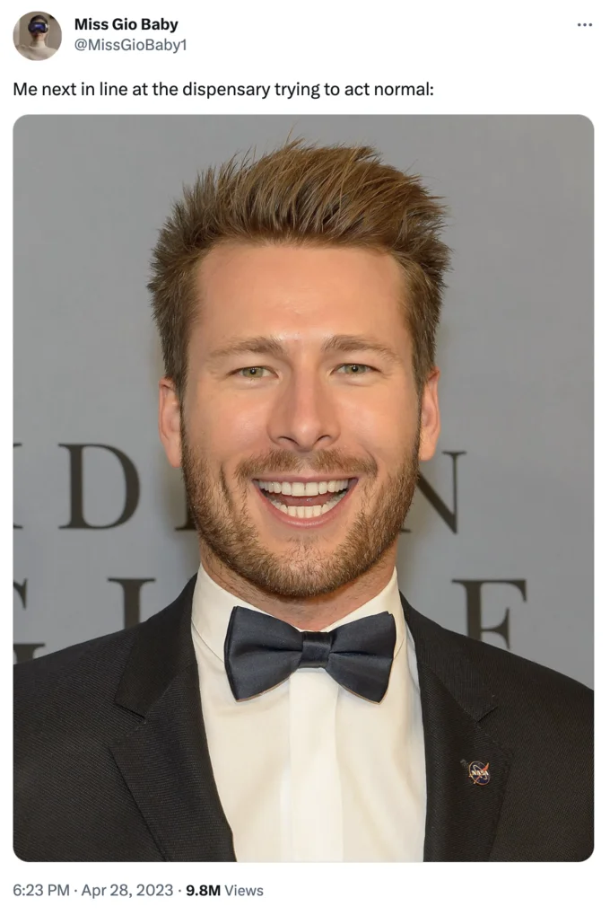 Glen Powell Capybara Face — Tweet from Miss Gio Baby showing the Glen Powell smile photo captioned about trying to act normal at the dispensary.