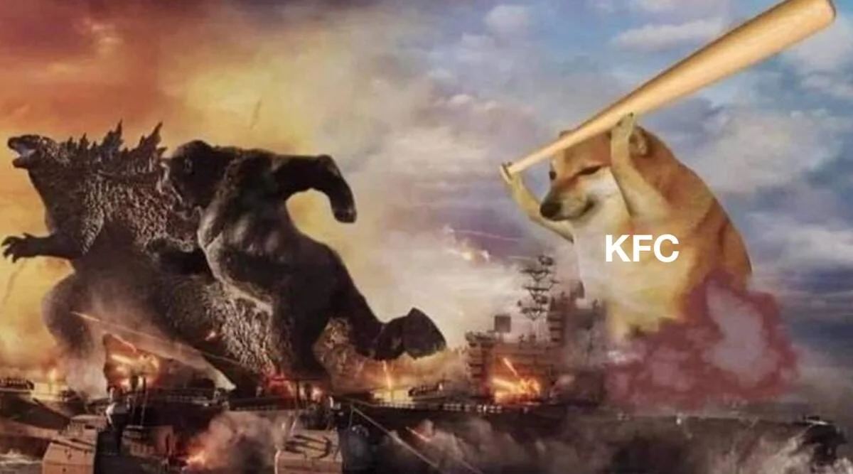 Godzilla vs Kong — Epic confrontation between Godzilla on left with spikes and Kong on right in aggressive stance with urban destruction below.