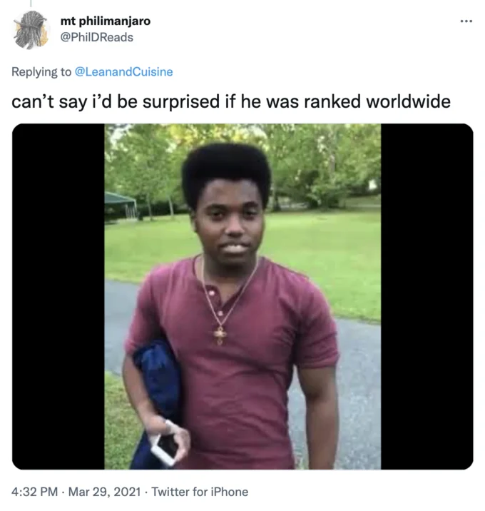 Good At Smash Bros Afro — Twitter reply showing a kid in a Mario shirt and shorts with a joking caption about losing at Smash Bros