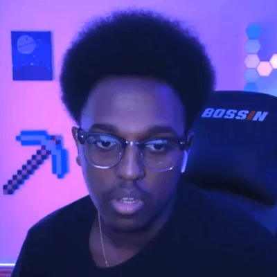 Good At Smash Bros Afro — Young Smash Bros player with an afro in Adidas sweatshirt posing for Momo tournament Top 8 graphic
