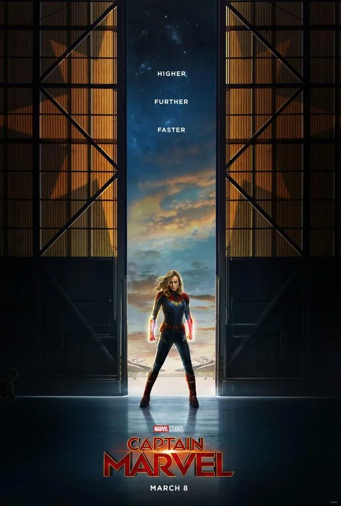 Captain Marvel movie poster with Brie Larson and Goose the cat in a hangar