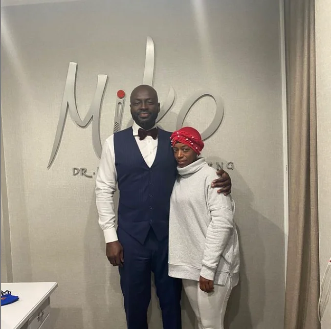 Gorilla Glue Girl — Tessica Brown poses with Dr. Michael Obeng after her free glue removal procedure