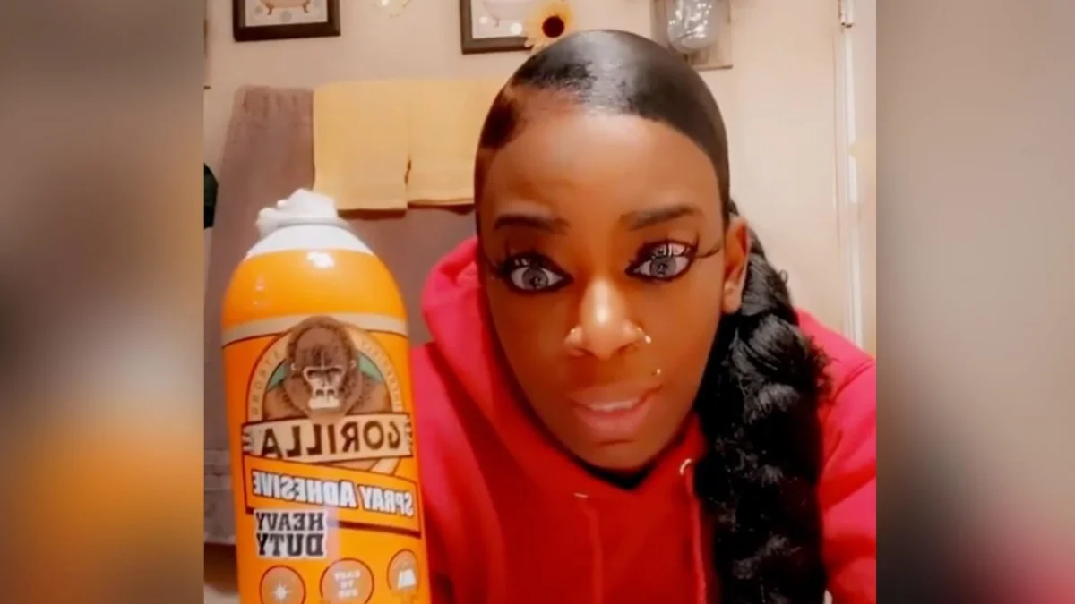 Gorilla Glue Girl — Tessica Brown looks shocked next to a Gorilla Spray Adhesive bottle in her original TikTok video