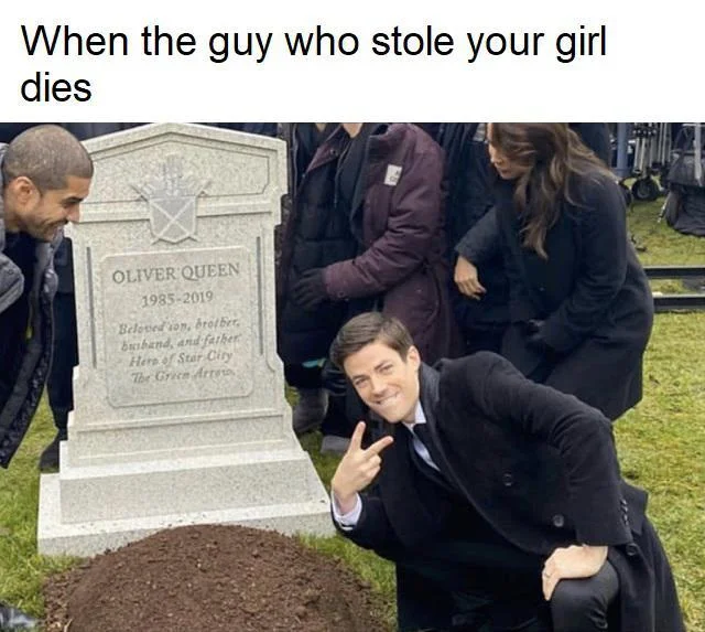 Grant Gustin Next To Oliver Queens Grave — Grant Gustin kneeling next to grave with peace sign, captioned with jealousy and revenge joke.