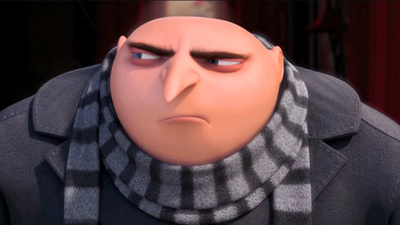 Grus Height Copypasta — Iconic screenshot of Gru from Despicable Me with bald head, scowl, and gray scarf.