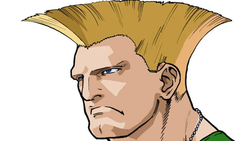 Guiles Theme Goes With Everything — Official Street Fighter character artwork of Guile showing signature flat-top blonde hair, blue eyes, and military jacket.
