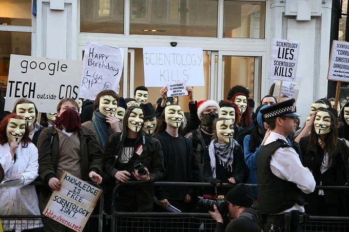 Anonymous protesters in Guy Fawkes masks demonstrating against Scientology