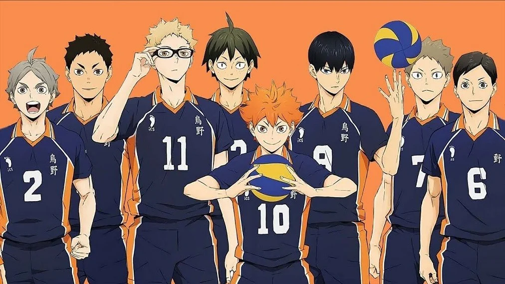 Karasuno High volleyball team members from Haikyuu!! posed together in navy and orange uniforms on an orange background