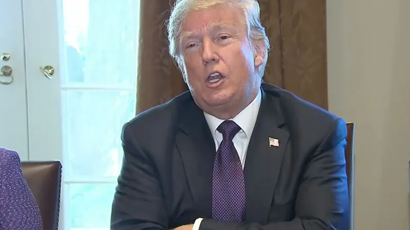 "He Knew What He Signed Up For" — Donald Trump speaking in a dark suit and purple tie during a White House event