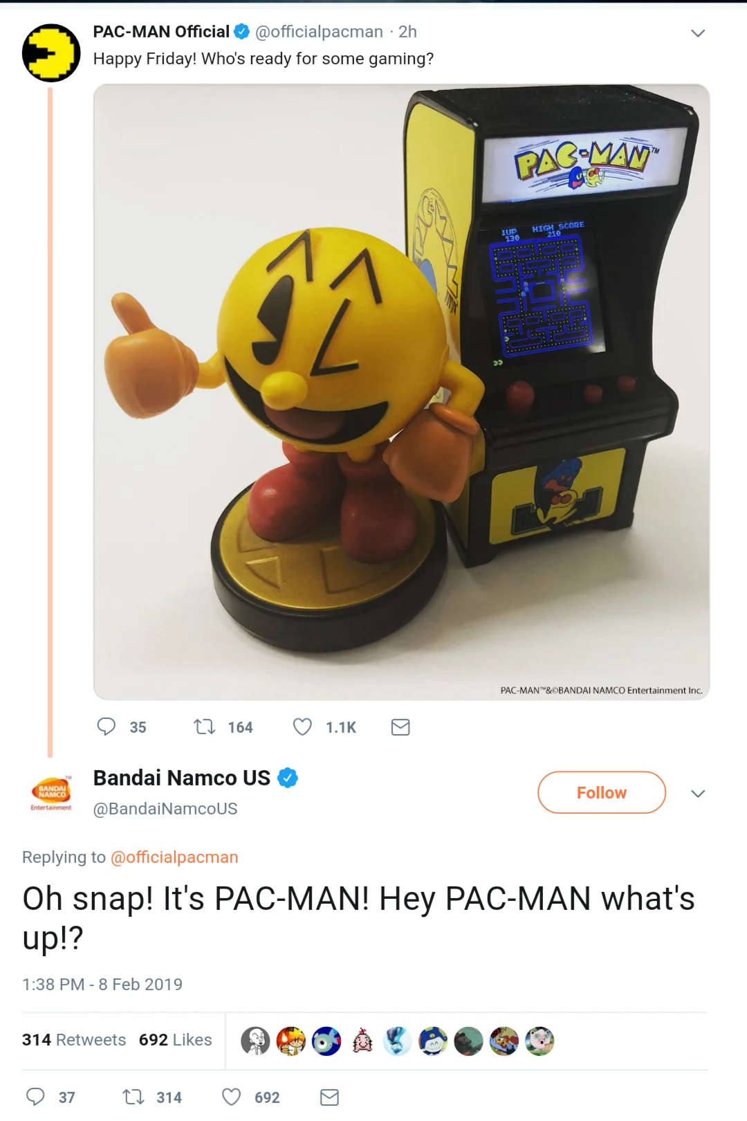 Here Comes Pacman — Twitter screenshot of PAC-MAN Official and Bandai Namco US exchanging greetings.