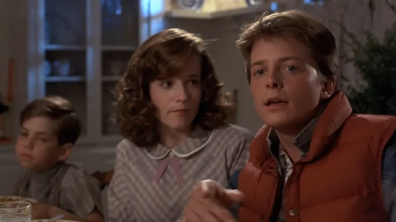 Hey Ive Seen This One — Clean source scene from Back to the Future showing three main characters in their iconic pose and indoor setting without text.