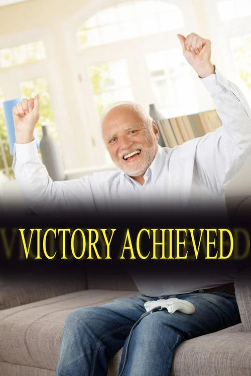 Hide the Pain Harold — Stock photo of Harold in white shirt with arms raised in victory pose on couch with game controller, overlaid with 'Victory Achieved'