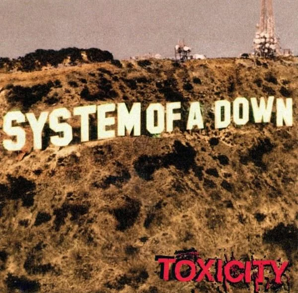 Hollywood Sign Parodies — System of a Down Toxicity album cover with hillside sign reading SYSTEM OF A DOWN