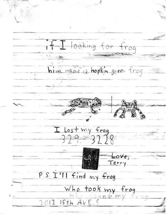 Handwritten missing posters taped to wooden planks featuring variations of 'Hopkin Green Frog' with contact information.