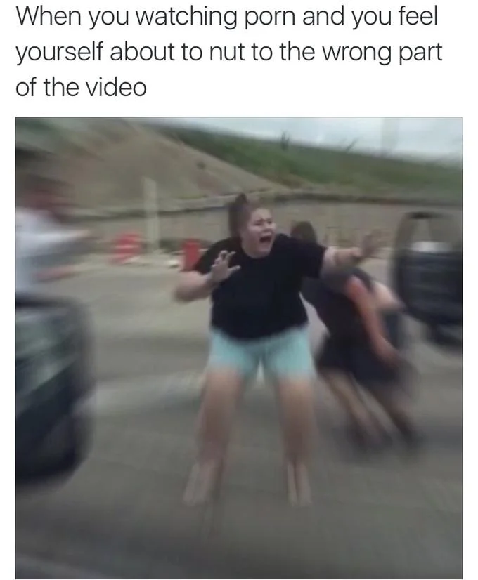 Houston Road Rage Brawl — Blurry still from road rage video with woman in black shirt and shorts with arms outstretched, captioned with humorous text.