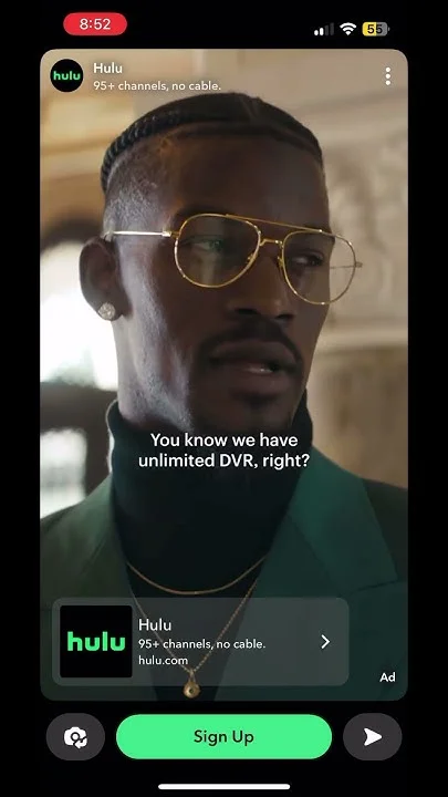 Hulu Ad Interruption — Smartphone screenshot of intrusive Hulu ad popup with man and 'You know we have unlimited DVR, right?' message.
