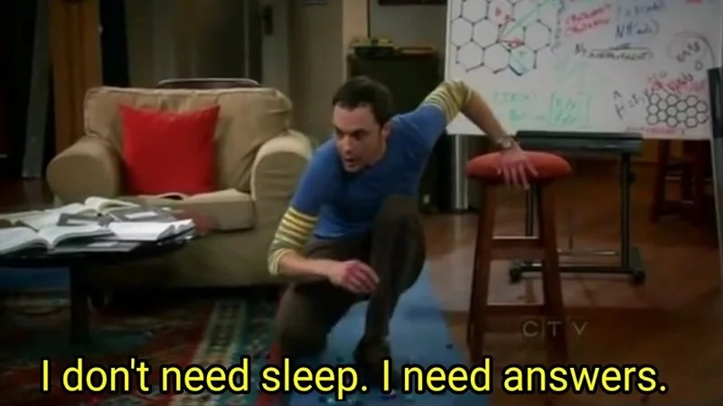 I Dont Need Sleep I Need Answers — Sheldon Cooper in signature analytical pose amid scattered papers with the defining quote clearly visible.