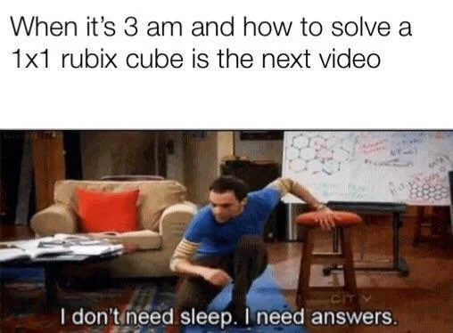 I Dont Need Sleep I Need Answers — Sheldon hunched over papers surrounded by research materials, captured by YouTube recommendation rabbit holes.