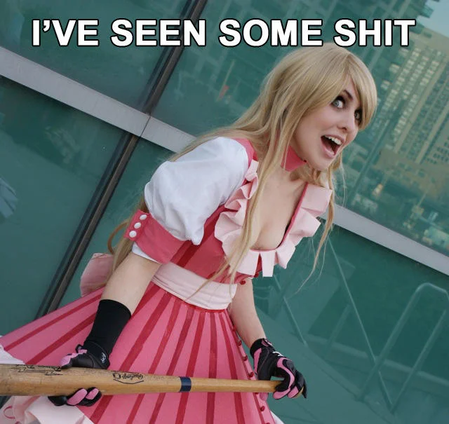 Cosplayer in pink dress with shocked expression holding a baseball bat, captioned 'I've seen some shit'