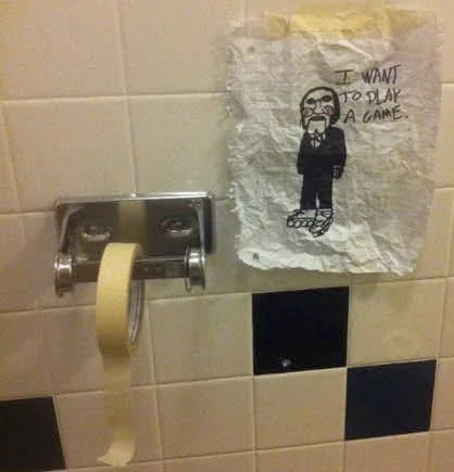 Saw logo, duct tape on toilet paper holder, and Billy the Puppet saying I want to play a game