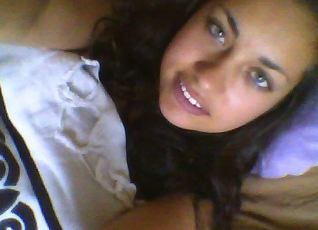 I Woke Up Like This — Brunette woman smiling in a just-woken-up selfie on a pillow.