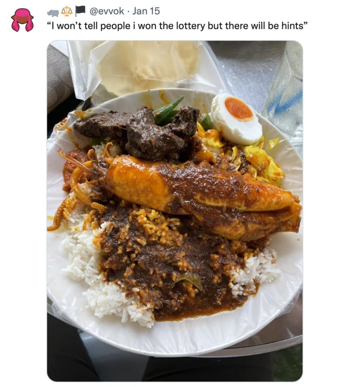 I Wouldn't Tell Anyone I Won The Lottery, But There Will Be Hints — Overflowing plate of rice, curry, meat and seafood posted on Twitter with the lottery hints