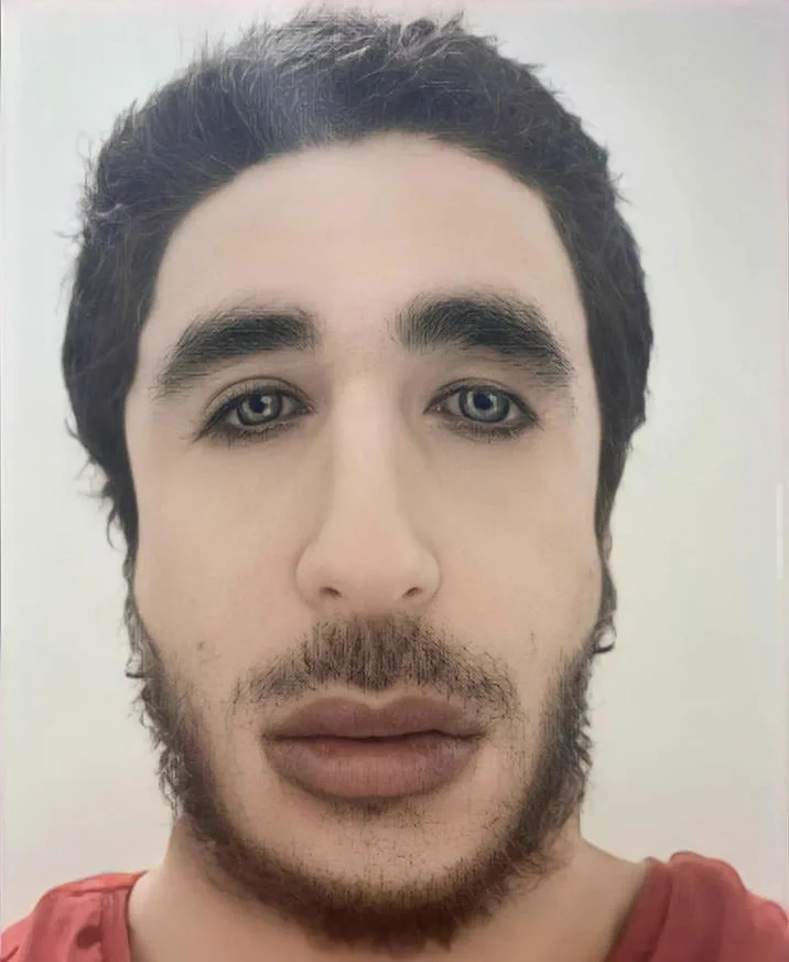 Ibo Eshak Ibohammad Eshakur — Cropped selfie portrait of Ibo Eshak in a red shirt