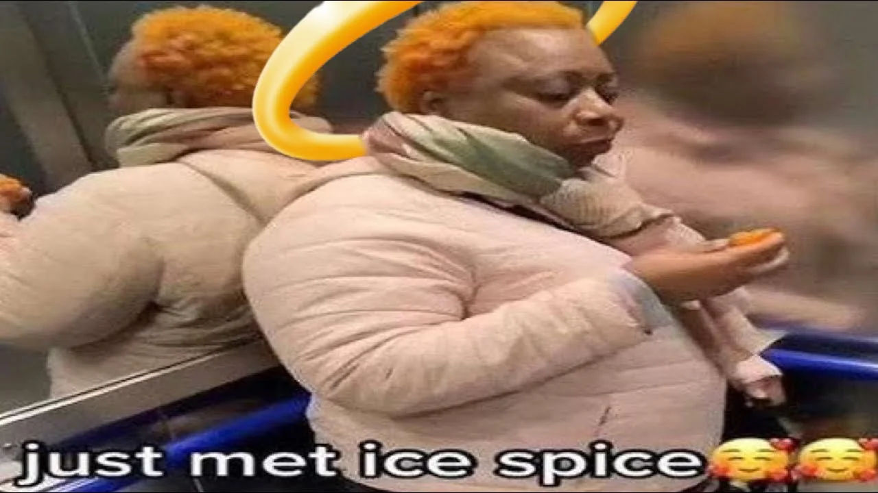 Ice Spice — Grainy subway photo showing person with orange curly hair eating.