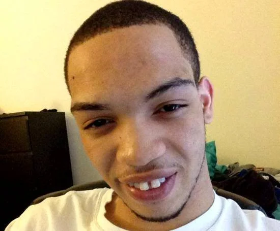 Close-up selfie portrait of rapper IceJJFish smiling