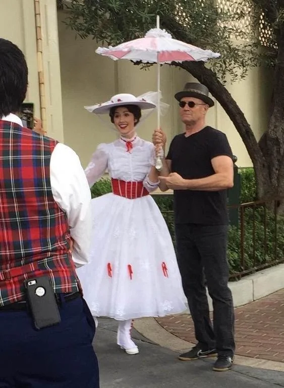 "I'm Mary Poppins, Y'all" — Michael Rooker posing at Disneyland with a Mary Poppins character actress.