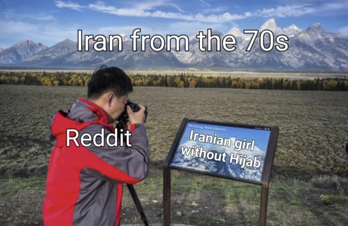 Iran Before The Islamic Revolution — Photographer in red jacket photographing roadside sign 'Iranian girl without Hijab' with mountain backdrop.