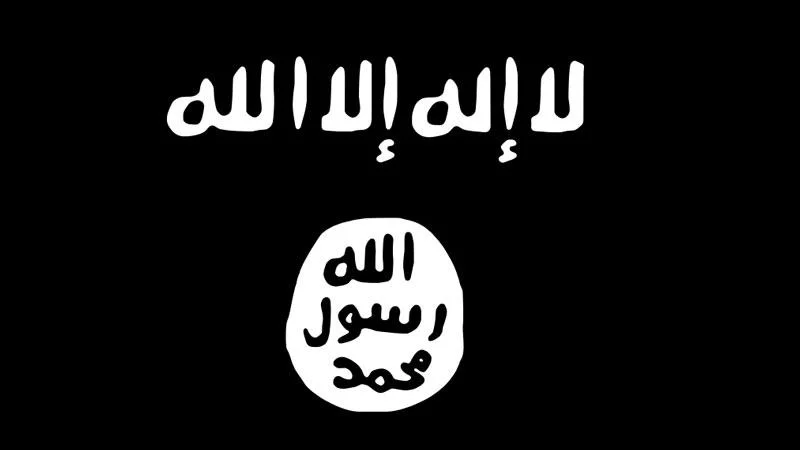 Black ISIS flag with white Arabic Shahada script and circular seal